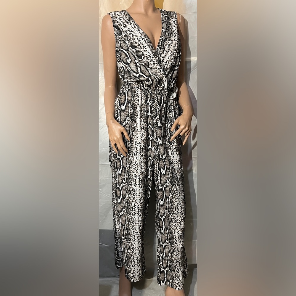 Indulge in style Snakeskin Jumpsuit Size 1X (New Without Tags)